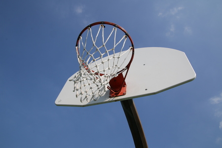 Under the hoop.