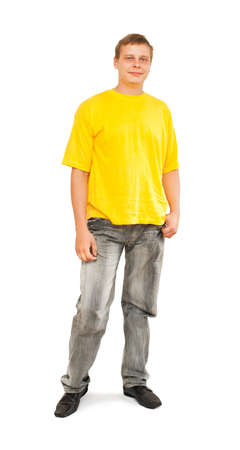 A young man stands on a white background
