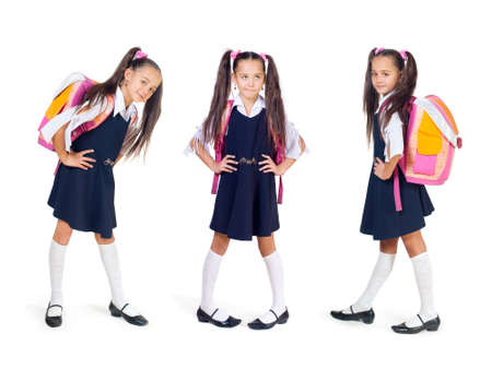 The girl with a school bag on a white backgroundの写真素材