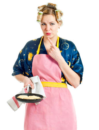 The woman the housewife, has burnt about a frying panの写真素材