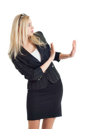 businesswoman is something repellent, white backgroundの写真素材
