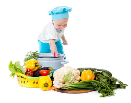 Baby Chef and vegetables, white backgroundの写真素材