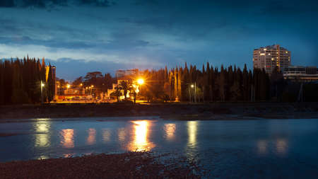 Night lights of the city and riverの写真素材