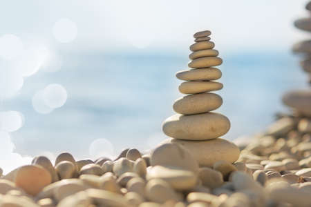 Balanced stones on the sea beachの写真素材