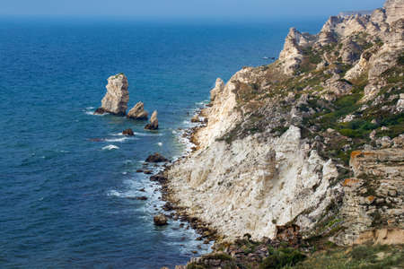 beautiful rocky sea coast under blue sky