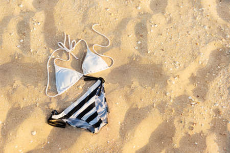 swimsuit for the beach in the sandの写真素材