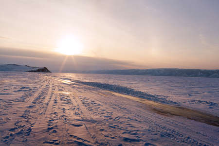 Lake Baikal snow at sunsetの写真素材