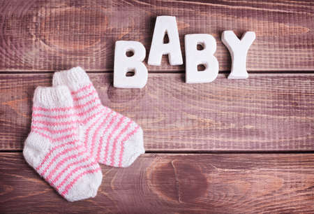 word baby on wood backgroundの写真素材