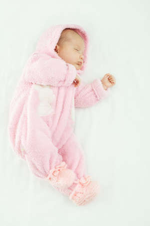 newborn baby one month age on white の写真素材