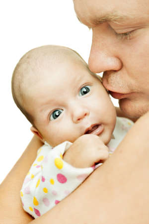newborn baby one month age in the hands of his father 