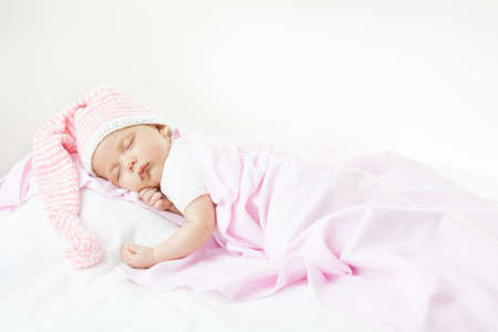 newborn baby one month age on whiteの写真素材