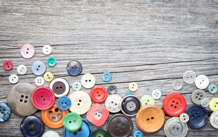 thread and sewing on wooden boards 