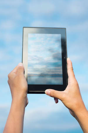 tablet pc in human handsの写真素材