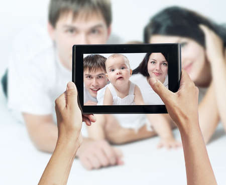 photo shooting on tablet pc, familyの写真素材