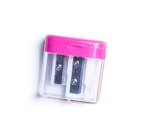 pink pencil sharpener on white backgroundの写真素材