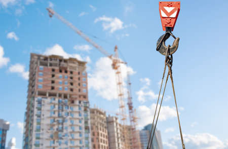 Crane at a construction site a new homeの写真素材