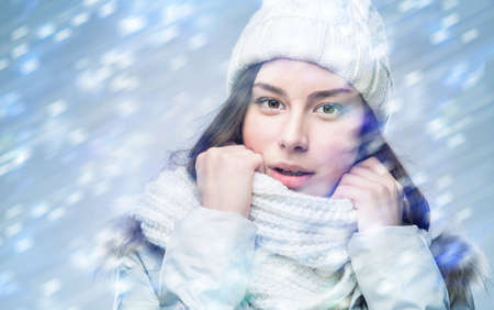 Face girl in winter hat, studioの写真素材