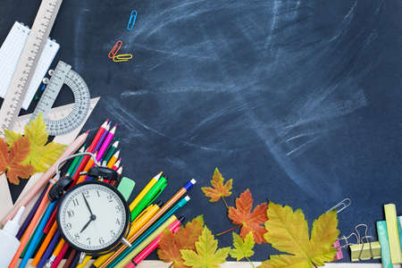 School supplies on the background of the teachers' board