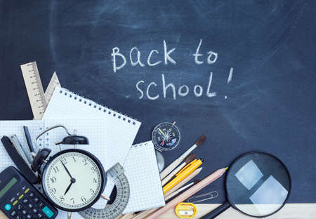 School supplies on the background of the teachers' board