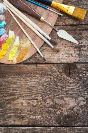 Items for children's creativity on a wooden backgroundの写真素材