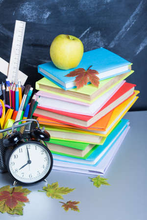School supplies on the background of the teachers' board