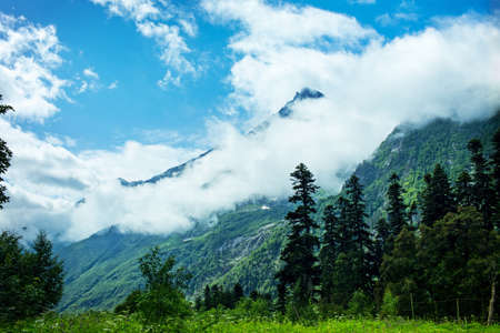The tops of the mountains. Village Dombay, Karachay Cherkessia Republic, Russiaの写真素材