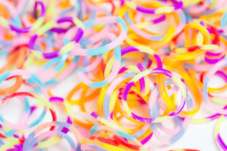 Rainbow loom- Colored rubber bands for weaving accessoriesの写真素材