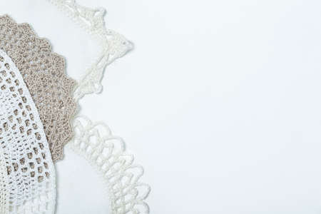 Handmade crocheted pot with wool and crocheting hookの写真素材