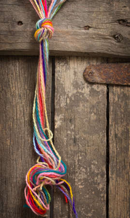 Knitting on the old boardの写真素材