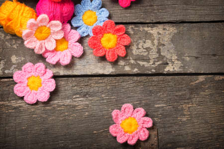 Knitting on the old boardの写真素材