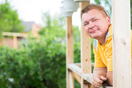 Portrait of a man in the gardenの写真素材