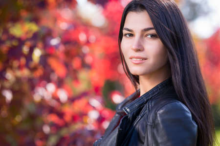 Young woman in autumn parkの写真素材