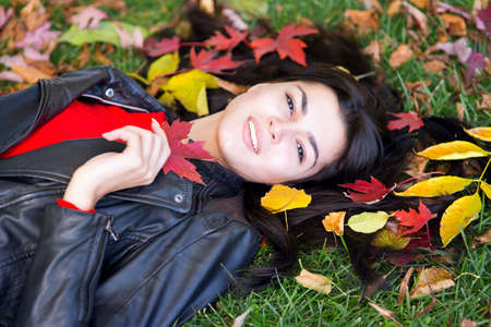 Young woman in autumn parkの写真素材