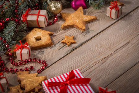 Christmas background with decorations  on wooden boardの写真素材
