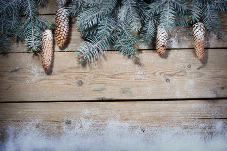 Christmas background with decorations  on wooden board
