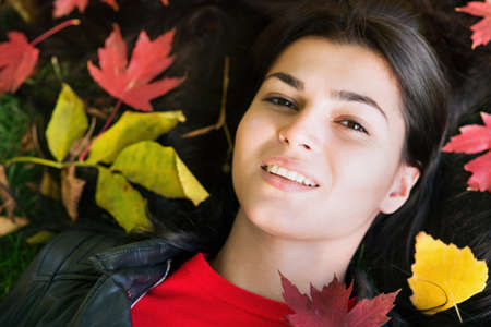 Young woman in autumn parkの写真素材