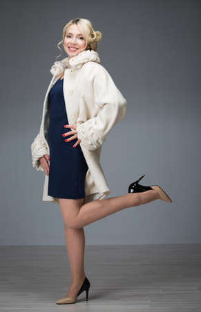 The woman in a beautiful white coatの写真素材