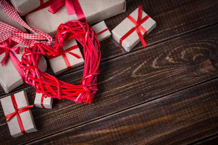 Red heart on wooden boards