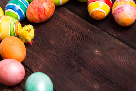 Easter eggs on wooden background