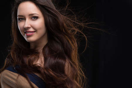 young woman with long beautiful hairの写真素材