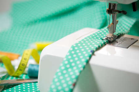 Sewing machine with a strip of tissue macroの写真素材