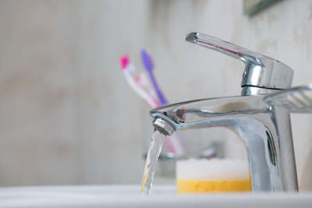Faucet with sink in the bathroom