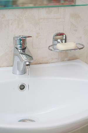 Faucet with sink in the bathroomの写真素材