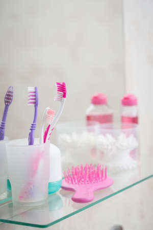 Toothbrush in the bathroom on the shelfの写真素材