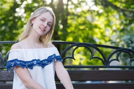 Young woman resting in the parkの写真素材