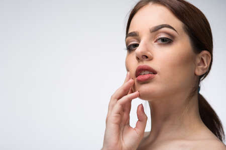 Teenage girl beautiful face dark hairの写真素材