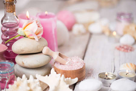 Beautiful composition of spa treatment on white wooden tableの写真素材