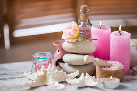 Beautiful composition of spa treatment on white wooden tableの写真素材