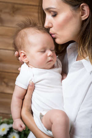Mom with a newborn baby of two months of ageの写真素材