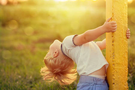 a boy of two years in the open airの写真素材